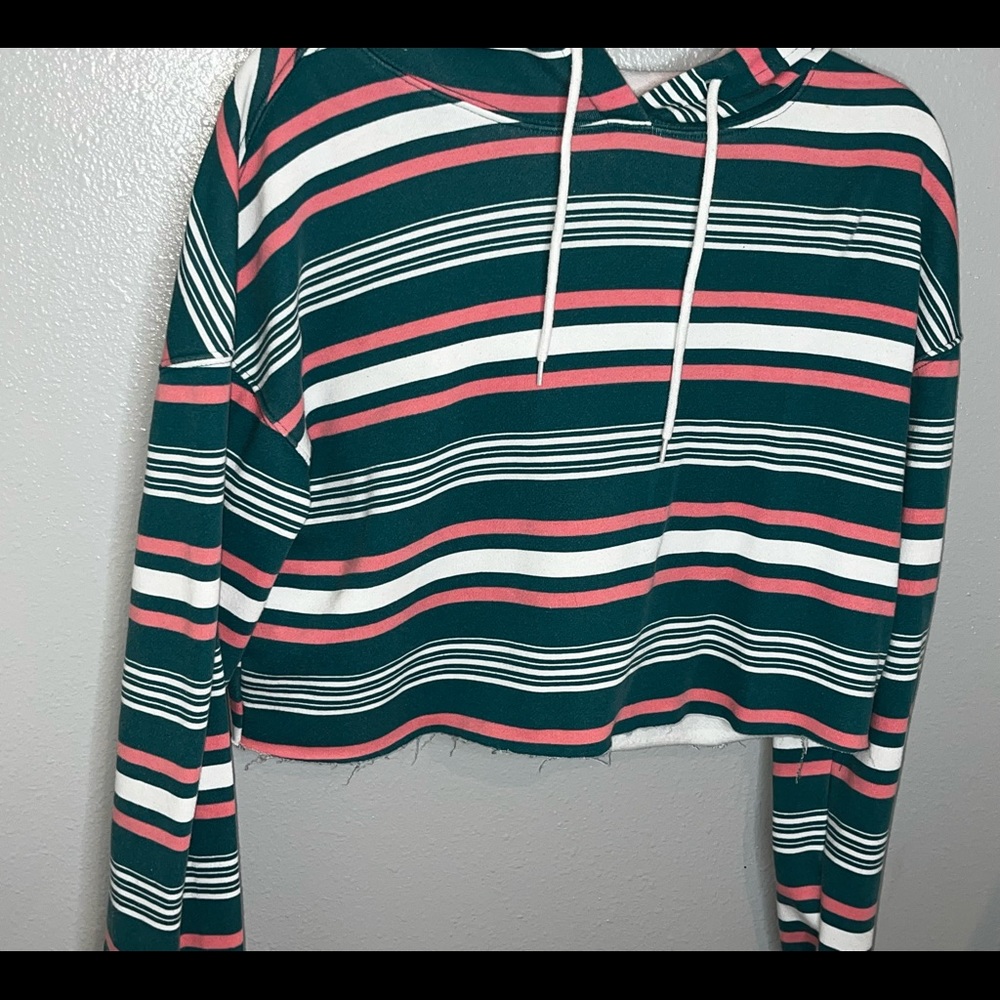 Pink, white, and green cropped light sweater.